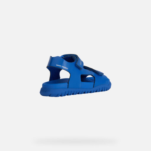 Water-Resistant Junior Sandal Created With Open-Air Adventures In Mind. Cast In A Monochrome Royal-Blue Palette, This Sporty-Looking Piece Of Footwear Is Lightweight, Flexible And Easy To Adjust. Crafted From A Quick-Drying Leather-Effect Material, It Is Set On A Tough Outsole With An Outstanding Grip On Slippery Terrain Too. - Húnar - Ec X20502 40