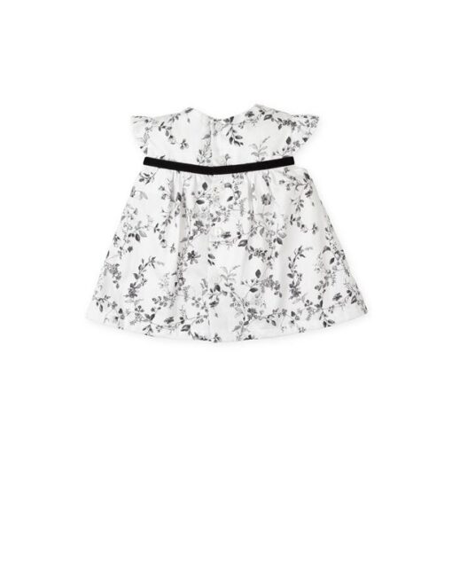 White Satin Dress Printed With Gray Flowers With Soft Petticoat. Yoke Cut With Velvet Ribbon And Anthracite Bow. Back Opening With Buttons. Composition - 100% Cotton Lining: 50% Cotton 50% Polyester - Húnar - 8266W24 S00 1